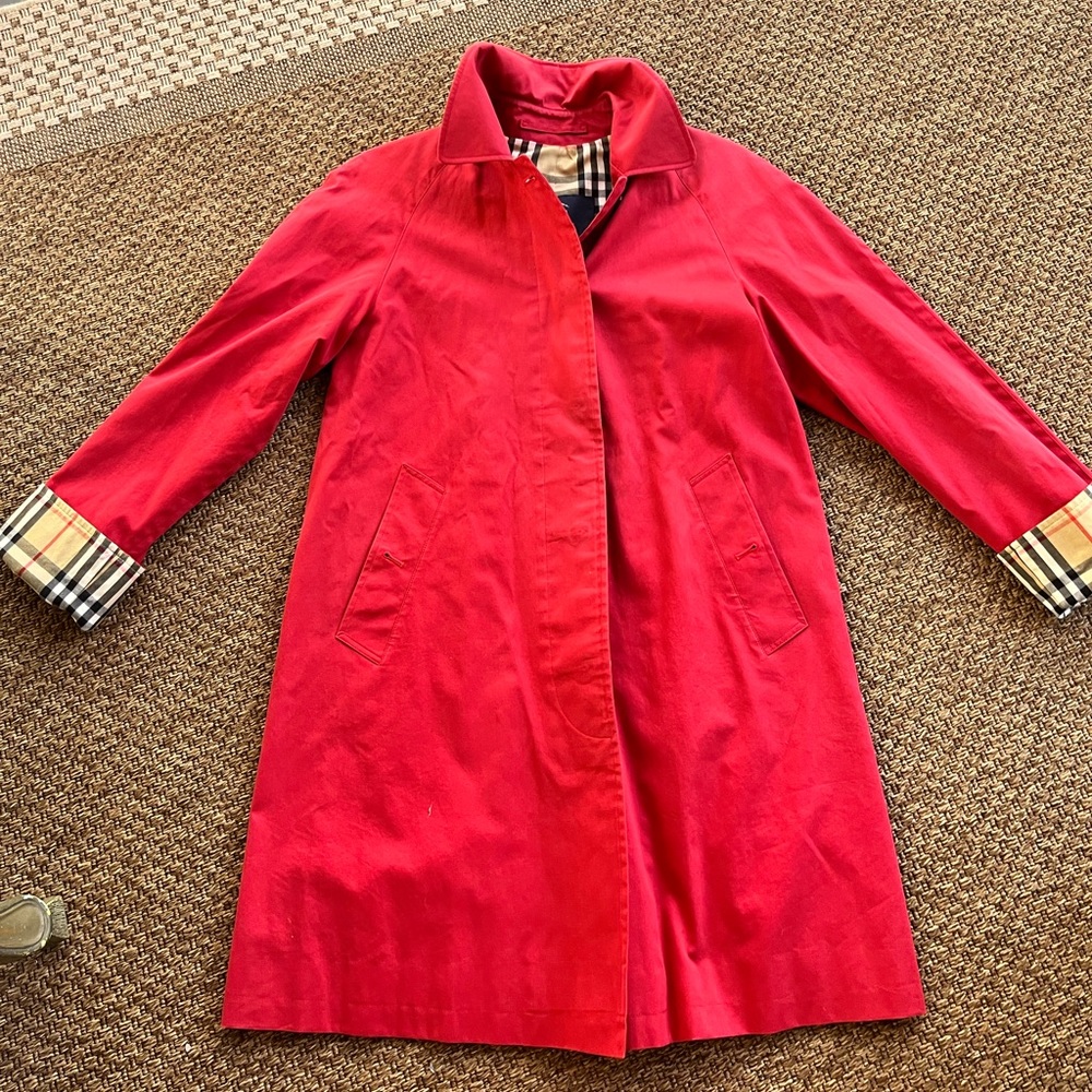 Classic Burberry red rain jacket (A-line). In good shape.